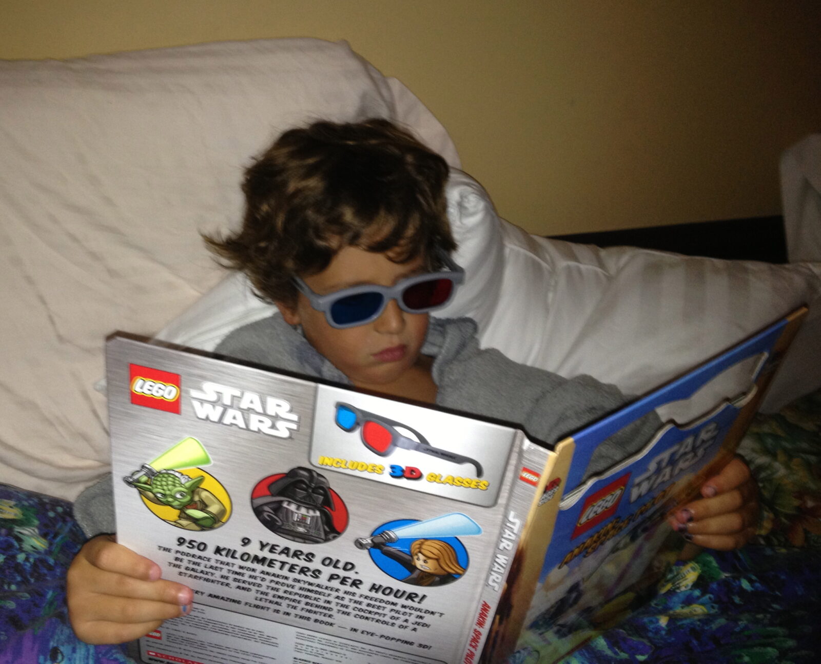 Cool kid reading with glasses